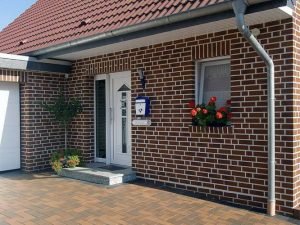 Отделка плиткой фасада здания